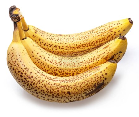Bananes avec des taches noires à la cueillette de sa douceur isolée sur blanc.