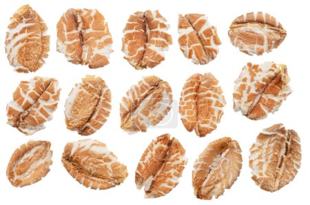 Collection of wheat flakes on gray background. File contains clipping paths.