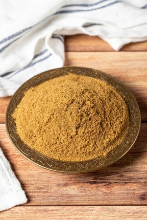 Photo for Powdered cumin spice. Cumin spice in bowl on wooden background. Dry spice concept. close up - Royalty Free Image