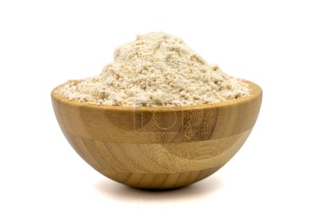 Photo for Mahlep powder isolated on white background. Mahlep powder in wooden bowl - Royalty Free Image