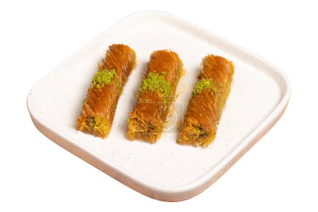 Kadayif with pistachios isolated on white background. Turkish cuisine delicacies. Ramadan Dessert. local name burma kadayif