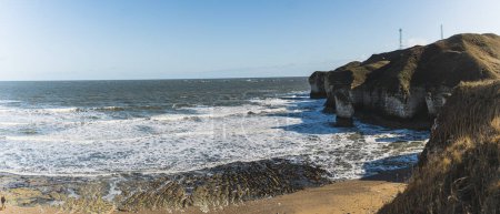 Photo for Famous tranquil seaside and nearby cliffs during sunny weather. Flamborough, Bridlington, Yorkshire, UK. High quality photo - Royalty Free Image