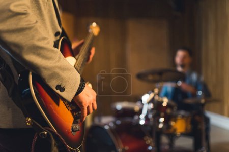 Photo for Young indie rock band playing the rehearsal before the concert . High quality photo - Royalty Free Image