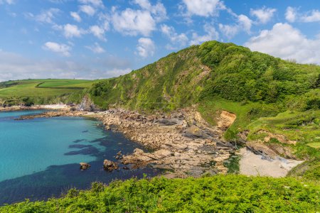Channel coast with beach and cliffs near Trenarren, Cornwall, England, UK