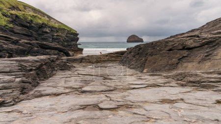 Clouds over the sea and cliffs of Trebarwith Beach, Cornwall, England, UK