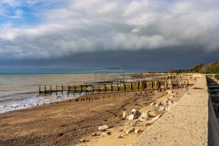 A storm approaching on the beach in Atherington, West Sussex, England, UK