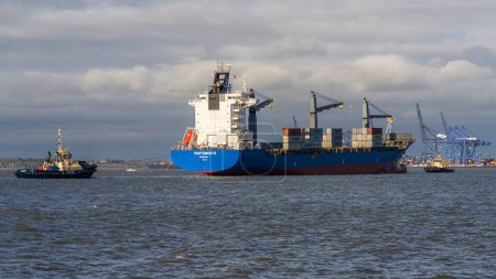 Photo for Felixstowe, Suffolk, England, UK - November 22, 2022: View of a container ship arriving at Felixstowe Harbour - Royalty Free Image