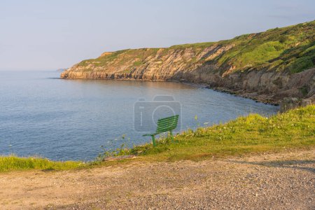 North Sea coast and cliffs at South Bay in Scarborough, North Yorkshire, England, UK