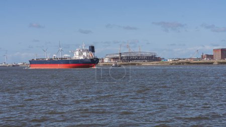 Liverpool, Merseyside, England, UK - May 15, 2023: A freight ship on the River Mersey