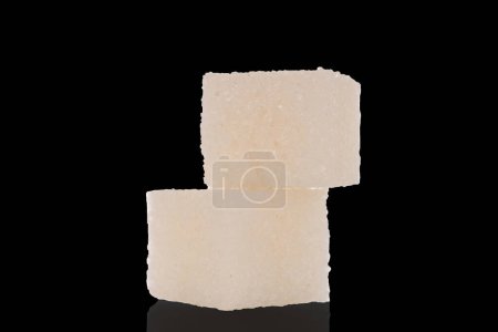 Photo for Two cubes of white sugar, macro, isolated on a black background. - Royalty Free Image