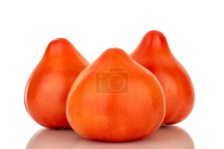 Photo for Three juicy red tomatoes, macro, isolated on white background. - Royalty Free Image