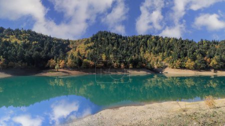 Photo for Plastira Lake, Autumn and reflections of clouds, Karditsa, Thessaly, Greece - Royalty Free Image