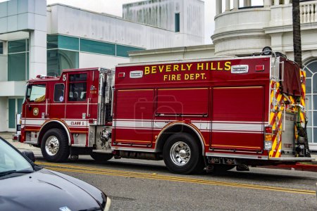 Photo for Los Angeles, United States of America; January 15, 2023: Official Beverly Hills fire truck, circulating on the streets of this town such as Rodeo Drive. - Royalty Free Image