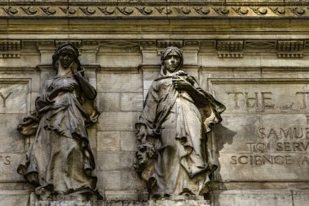 Photo for Monuments and statues of Manhattan, which adorn the facade of the New York Public Library in the Big Apple. It is an icon in the world. - Royalty Free Image
