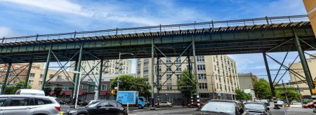Photo for New York, USA; June 3, 2023: The typical overhead train and streetcar tracks of the Bronx, which is a neighborhood of the Big Apple. - Royalty Free Image