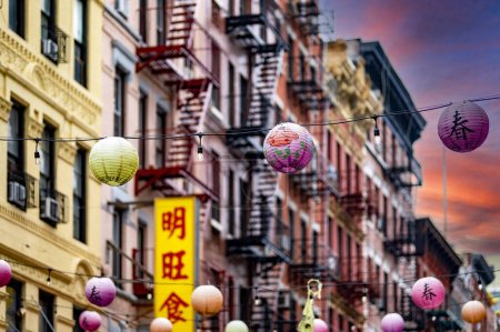 Chinese lanterns in Chinatown which is a very lively and populated neighborhood, influenced by the Asian culture where the Chinese New Year is celebrated in New York (USA).