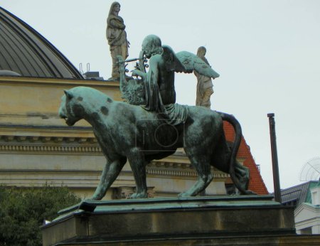 Germany, Berlin, Gendarmenmarkt, Berlin Concert Hall (Konzerthaus Berlin), bronze lion and angel statue in front of the concert hall
