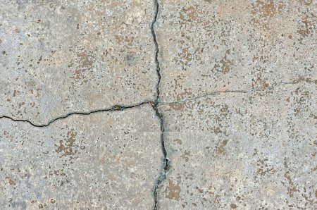 cracked concrete wall or ground with gray cement surface as background