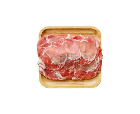 Pork neck slices on a wooden plate for shabu, hot pot, grill, korean BBQ. isolated on white background with clipping path