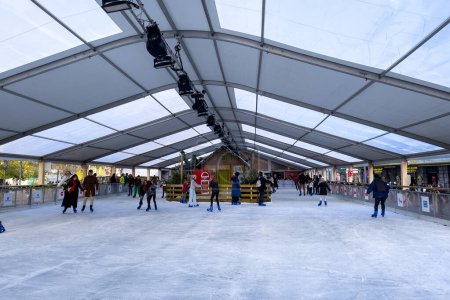 Photo for People ice skating on a rink in Brussels, Belgium - Royalty Free Image