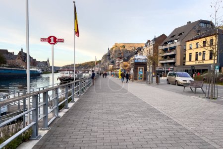 Photo for People walking in the street in Dinant, Belgium - Royalty Free Image