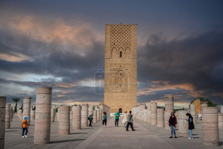 Photo for People walking around the medieval columns next to the Hassan tower in Rabat, Morocco - Royalty Free Image