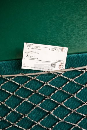 Photo for Railway ticket stuck in a trash basket inside a high speed train in Morocco - Royalty Free Image