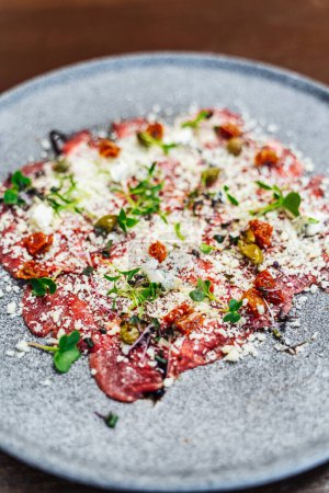Close-up of a beautiful plate of veal carpaccio