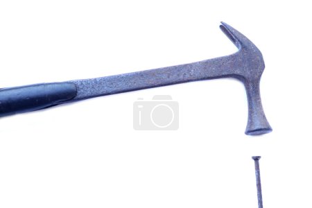 Photo for Old hammer and  iron nails isolated on white background. Concept, carpentry and construction tools. - Royalty Free Image