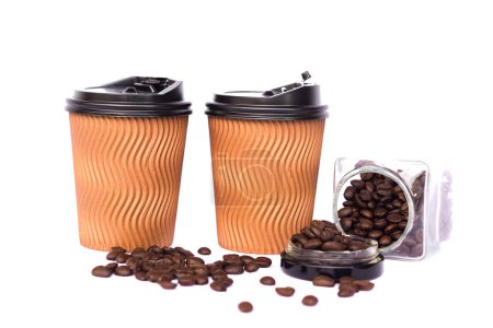Photo for Two brown cups of coffee, glass jar of coffee beans isolated on white background. Concept, Coffee time drinking. Takeaway coffee cup with black lid which can be recycled or making DIY crafts. - Royalty Free Image