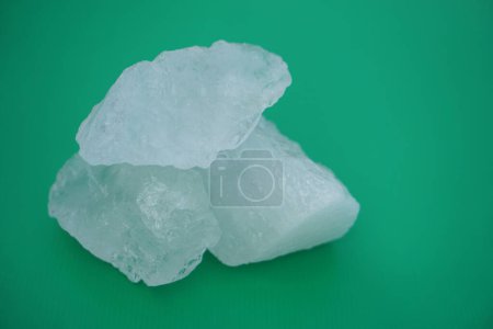 Photo for Crystal white alum stones or Potassium alum. Useful for beauty and spa treatment. Use to treat body odor under the armpits as deodorant and make water clear. - Royalty Free Image