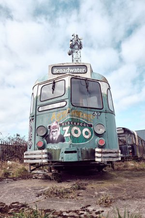 Photo for Blackpool, uk 01.01.2023 Old forgotten rusty Blackpool trams. Famous iconic seaside tourist attraction transport carriages. Rusting historic iconic trams rusting and rotting in a scrapyard. - Royalty Free Image