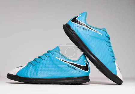 Photo for Kent, uk 01.01.2023 Shoes football Kids Nike Hypervenom Phade 3 TF JR Junior Trainers blue black and white training sports boots. iconic soccer shoes. - Royalty Free Image