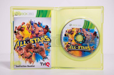 Photo for Kent, england, 01.01.2023 An original XBOX WWE wrestling All stars Microsoft video retro vintage game disc and case. Original xbox console gaming. Rare vintage video games. - Royalty Free Image