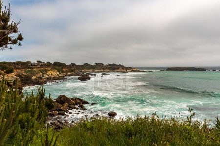 View of the Paciic Ocean from Gualala Point Regional Park, California, USA, on a parly cloudy day space for copy