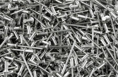 Photo for Blind Rivets, metallic, hardware, tool, equipment background. - Royalty Free Image