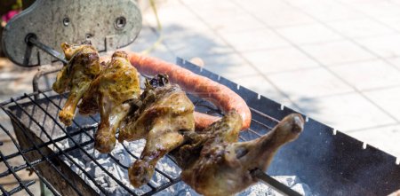 Photo for Typical Greek barbeque, with sausage and chicken - Royalty Free Image