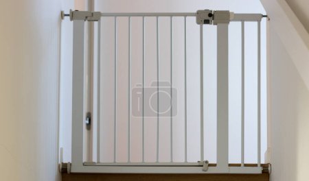 Photo for Child safety gate at home; childhood concepts - Royalty Free Image