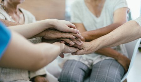 Photo for Background of elderly human bare hands join together in the middle under with indoors light. Concept Elderly nursing care help and support. Service mind for senior people. - Royalty Free Image