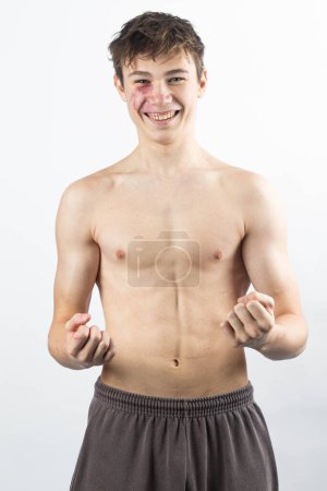 Photo for A portrait of a 17 year old shirtless muscular teenage boy - Royalty Free Image