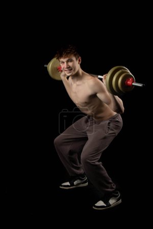 Photo for A 17 year old shirtless muscular teenage boy - Royalty Free Image