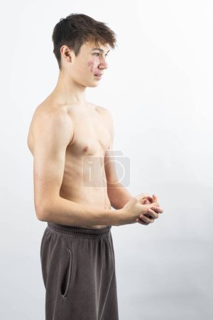 Photo for A portrait of a 17 year old shirtless muscular teenage boy - Royalty Free Image