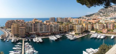 Photo for Monaco-Ville, Monaco, April 20th 2023:- A view of Port Fontvieille, taken from Monaco-Ville, the old city of Monaco. - Royalty Free Image