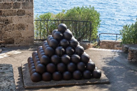 Photo for Monaco-Ville, Monaco, April 20th 2023:- A view of a pile of Canon Balls, near Fort Antoine Theatre - Royalty Free Image