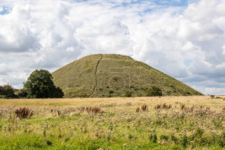 Photo for Silbury Hill a Neolithic mound, part of the Avebury Unesco World Heritage Site - Royalty Free Image