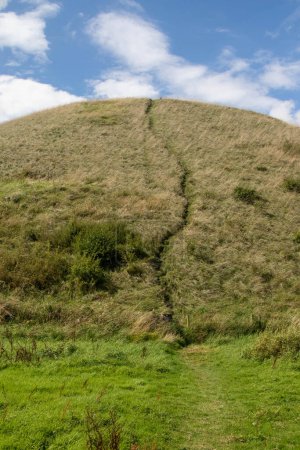 Photo for Silbury Hill a Neolithic mound, part of the Avebury Unesco World Heritage Site - Royalty Free Image
