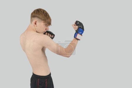 Photo for Shirtless male teenage MMA fighter - Royalty Free Image