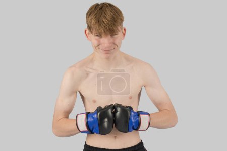 Photo for Shirtless male teenage MMA fighter posing - Royalty Free Image
