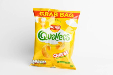 Photo for London, United Kingdom, 29th January 2024:- A packet of Walkers Quavers Cheese British Potato Snacks on a white background - Royalty Free Image