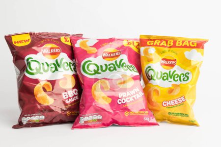 Photo for London, United Kingdom, 29th January 2024:- A selection of  Walkers Quavers British Potato Snacks on a white background - Royalty Free Image
